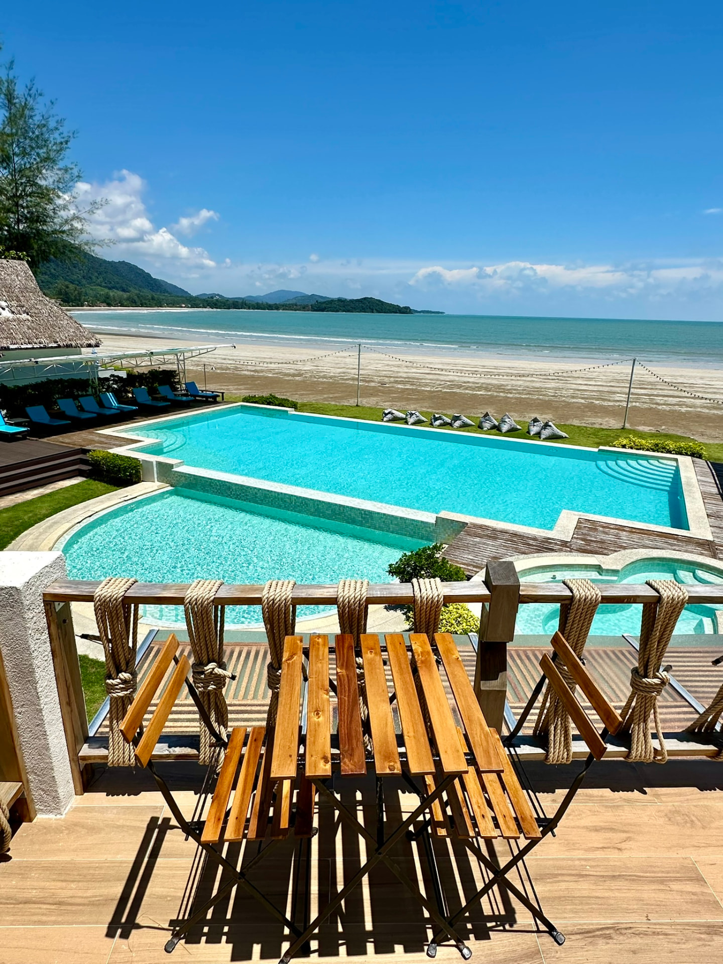 Pools, beach and the bay seen from the Northstar terrace table