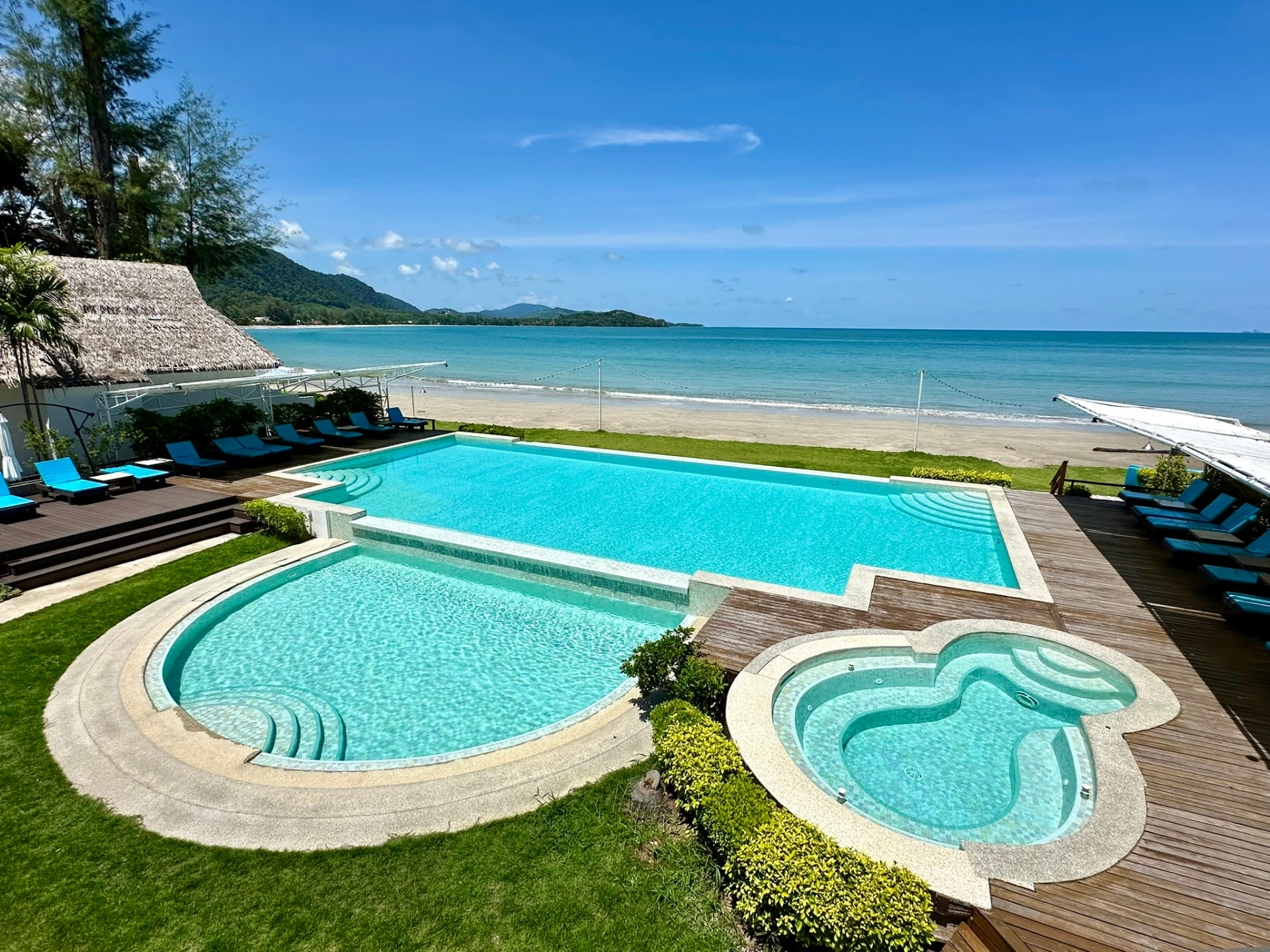 The beachfront pools, jacuzzi and loungers seen from above