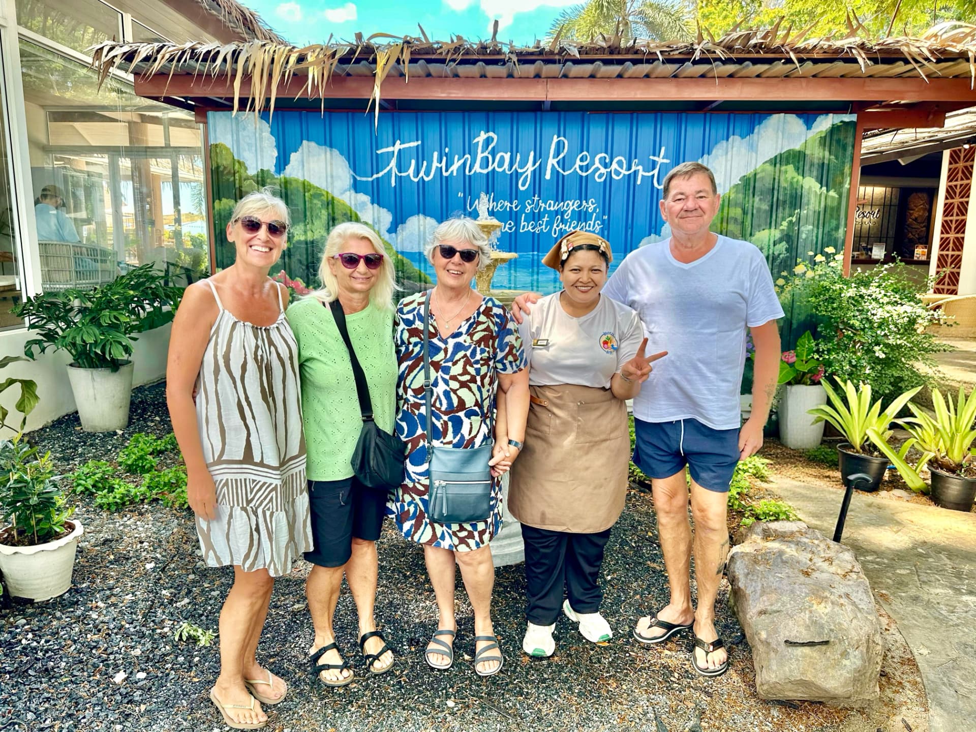 Guests and team together at TwinBay Resort